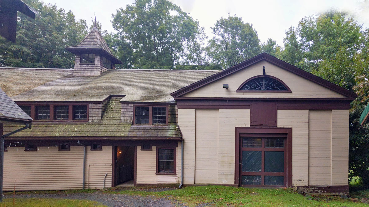 The north facade of the carriage house and barn. Photo courtesy of Spencer Preservation Group.